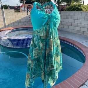 NWOT Aqua blue 2 piece swim suit with long, flowing mesh leaf print